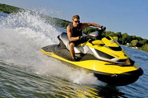 Despite being almost identical to the GTX Limited iS, the Sea-Doo RXT iS looks more sporty in its yellow and black livery.