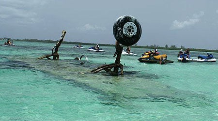 Riding PWCs around a shallow-water plane crash.
